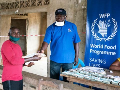 A beneficiary receiving his cash A beneficiary receiving his cash