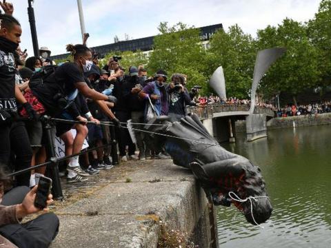 Anti-racism protesters tear down a statue of 17th century slave owner Edward Colston in Bristol Anti-racism protesters tear down a statue of 17th century slave owner Edward Colston in Bristol