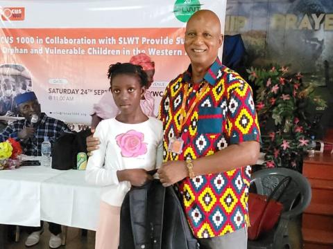 Alhaji Mohamed Bailor Jalloh, handing over school materials to Ebola and Mudslides survivors Alhaji Mohamed Bailor Jalloh, handing over school materials to Ebola and Mudslides survivors