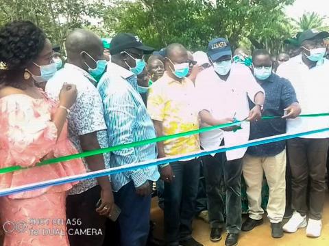 CM cutting the tape at the St joseph secondary school bridge linking blame center CM cutting the tape at the St joseph secondary school bridge linking blame center