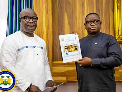 ECSL chief presenting the report to President Bio ECSL chief presenting the report to President Bio