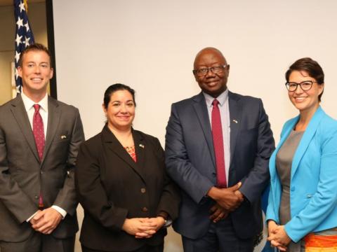 Energy Minister Kanja Sesay poses with US officials Energy Minister Kanja Sesay poses with US officials