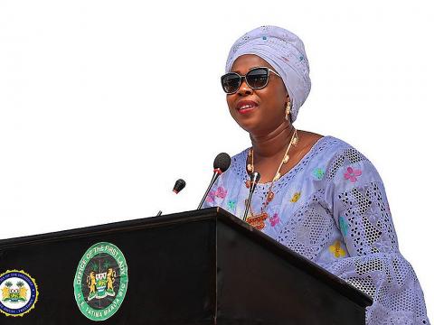 First Lady, Fatima Bio reading the report card to President Bio First Lady, Fatima Bio reading the report card to President Bio