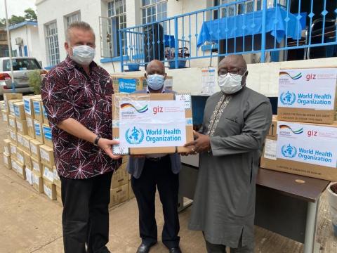 GIZ and WHO representatives handover donated items to Chief Medical Officer, Rev. TT Samba GIZ and WHO representatives handover donated items to Chief Medical Officer, Rev. TT Samba