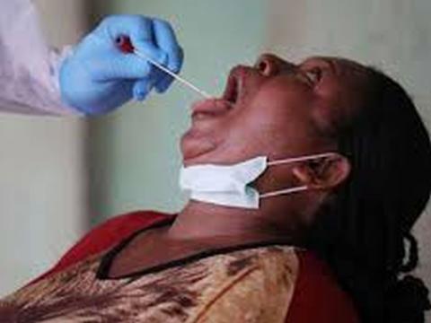 Health worker collects sample for Covid-19 test Health worker collects sample for Covid-19 test