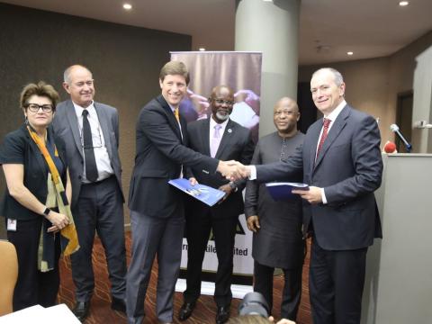 IFC and SRL officials after Monday's signing ceremony IFC and SRL officials after Monday's signing ceremony