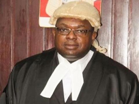 Justice Adrian Fisher Justice Adrian Fisher