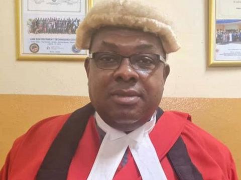 Justice Adrian Fisher Justice Adrian Fisher