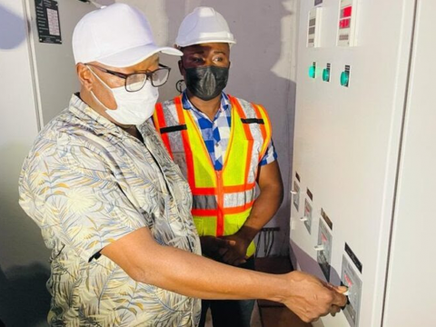 Kanja Sesay switching on the power in Thonko Limba Kanja Sesay switching on the power in Thonko Limba