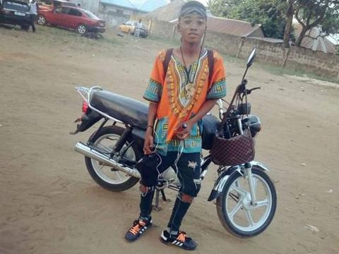 Late Abu Bakarr posed with his Okada Late Abu Bakarr posed with his Okada