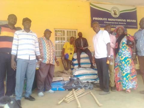 Members of the various cooperative farmers and staff of SLPMB pose with some of the prizes Members of the various cooperative farmers and staff of SLPMB pose with some of the prizes