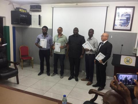 Minister of Trade and Industry, Dr. Edward Hinga Sandy, and representatives of the four factories at the signing ceremony Minister of Trade and Industry, Dr. Edward Hinga Sandy, and representatives of the four factories at the signing ceremony