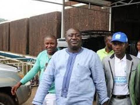 NaCRA Boss, Mohamed Massaquoi flanked by staff NaCRA Boss, Mohamed Massaquoi flanked by staff