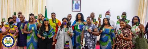 New Sierra Leoneans brandishing their new passports New Sierra Leoneans brandishing their new passports
