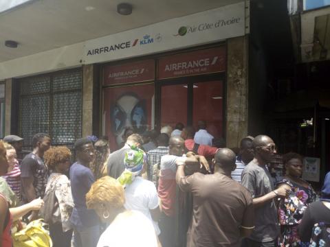 Passengers outside Air France's office Passengers outside Air France's office