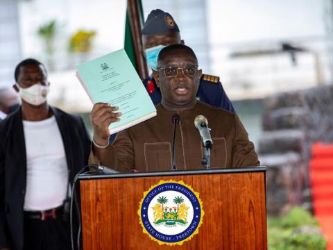 President Maada Bio with the CoI reports and White Paper President Maada Bio with the CoI reports and White Paper