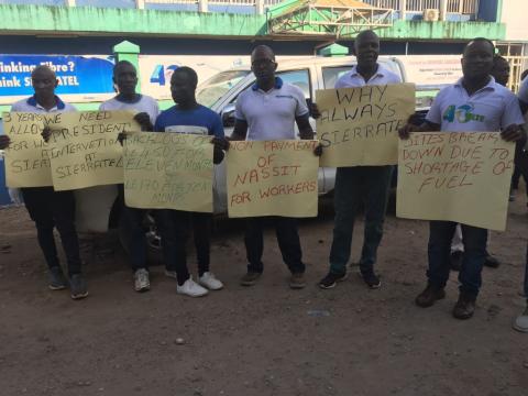 Sierratel angry staff displaying placards at the headquarters in Freetown Sierratel angry staff displaying placards at the headquarters in Freetown
