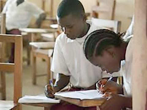 Students writing an exam Students writing an exam