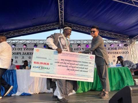 Symbolic handing over of cheque Symbolic handing over of cheque