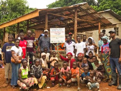 Kober Water community in front of their hut Kober Water community in front of their hut