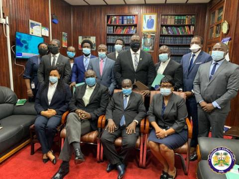 The 12 appointed Notries pose with Chief Justice The 12 appointed Notries pose with Chief Justice