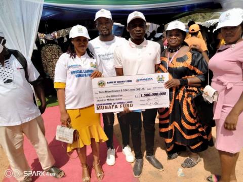 Trust Microfinance display Munafa Fund Cheque Trust Microfinance display Munafa Fund Cheque