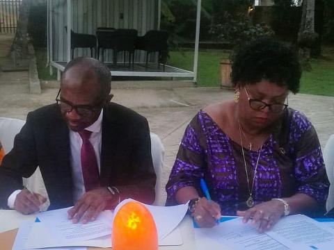 UNDP boss and the MRU Secretary General signing the MOU UNDP boss and the MRU Secretary General signing the MOU