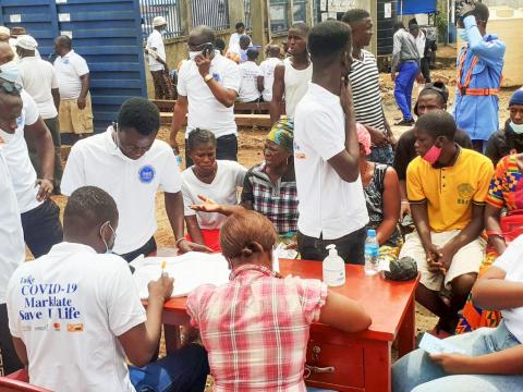 Volunteers take Covid-19 jabs during launch of the mass vaccination campaign in Tombo Volunteers take Covid-19 jabs during launch of the mass vaccination campaign in Tombo